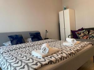 Posteľ alebo postele v izbe v ubytovaní Marcina Kasprzaka 29c