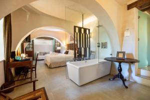 Łóżko lub łóżka w pokoju w obiekcie Hotel Boutique V