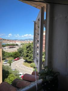 a window of a building with a view of a street at Apartment Felix in Split