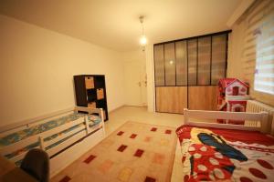 Postel nebo postele na pokoji v ubytování Hébergement entier grande surface 7 adultes