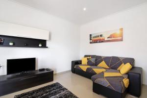 Posezení v ubytování Apartment Paradise T2 - Fuseta