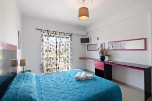 Postel nebo postele na pokoji v ubytování Apartment Paradise T2 - Fuseta + 13 fotografií