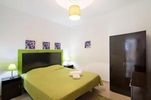 Postel nebo postele na pokoji v ubytování Apartment Paradise T2 - Fuseta