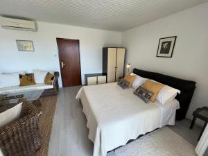 Postel nebo postele na pokoji v ubytování Apartments Kale Center