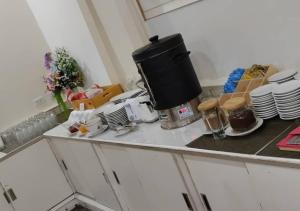 Kuchyň nebo kuchyňský kout v ubytování โรงแรมวีวิช V Wish Hotel