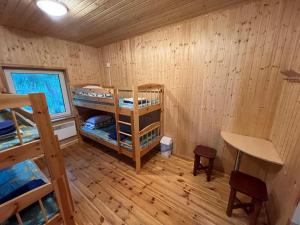 Postel nebo postele na pokoji v ubytování Alutaguse Tervisespordikeskuse Kämpingud