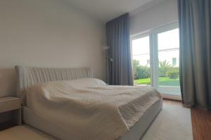Posteľ alebo postele v izbe v ubytovaní Skiper Apartments & Golf Resort