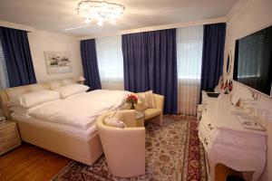 Postel nebo postele na pokoji v ubytování Höckner Plaza Hotel