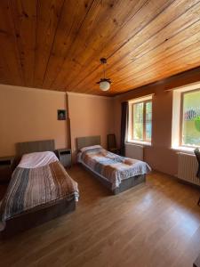 Voodi või voodid majutusasutuse Guesthouse Edena toas