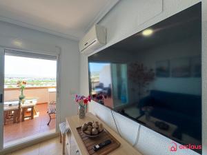 TV a/nebo společenská místnost v ubytování La Aurora