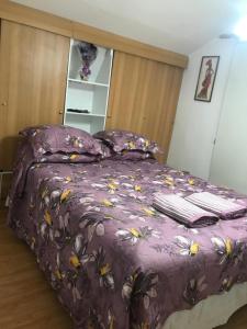 Кровать или кровати в номере Bienvenidos a mí casa