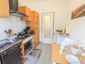 Η κουζίνα ή μικρή κουζίνα στο HW3B- Urlaubsmagie - großes Wohnzimmer & 2 Schlafzimmer