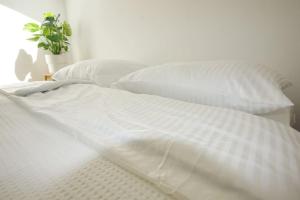 Postel nebo postele na pokoji v ubytování Quartier 27 - Apartment 60m2