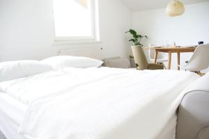 Postel nebo postele na pokoji v ubytování Quartier 27 - Apartment 60m2