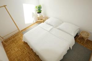 Postel nebo postele na pokoji v ubytování Quartier 27 - Apartment 60m2