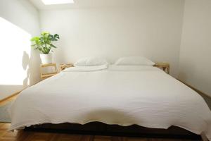 Postel nebo postele na pokoji v ubytování Quartier 27 - Apartment 60m2