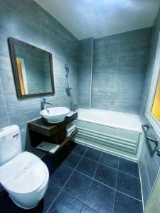 Koupelna v ubytování Hua Xiang Motel - Nanzih + 3 fotografie