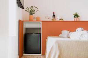 Postel nebo postele na pokoji v ubytování Palazzo D'Azeglio