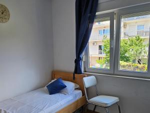 Posteľ alebo postele v izbe v ubytovaní apartment with a magical view