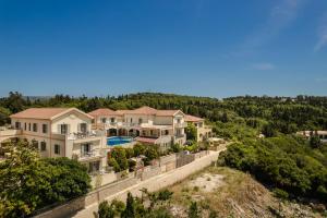 an aerial view of a house at Belle View Hotel - Sea View & Sunset in Mánganos