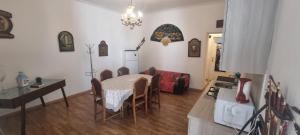 A seating area at room "Al Cristo Velato"