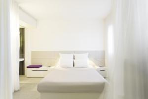 Кровать или кровати в номере Novotel Suites Perpignan Centre