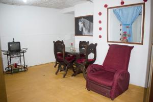 Posezení v ubytování Alojamiento Nela + 7 fotografií