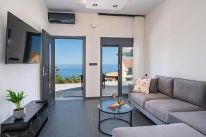 Posezení v ubytování PNOẼ Luxury Apartments