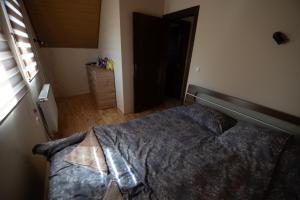 Postel nebo postele na pokoji v ubytování Planinska kuca Pantelic