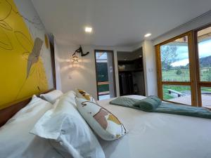 Postel nebo postele na pokoji v ubytování Casa del Oro