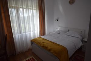 Postel nebo postele na pokoji v ubytování La Radacini