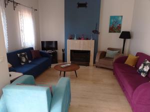 Χώρος καθιστικού στο Villa Tibet