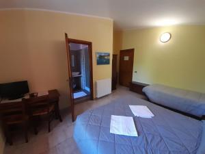 TV a/nebo společenská místnost v ubytování Hotel Sant'elene