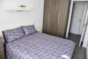 Postel nebo postele na pokoji v ubytování Villa Antonella, app. Vittoria