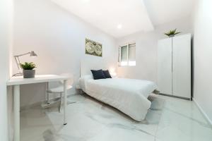 Posteľ alebo postele v izbe v ubytovaní Apartamento San Félix, Playa La Caleta