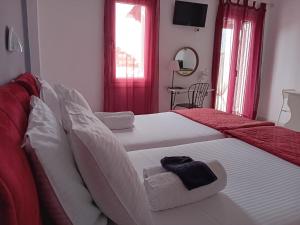 Letto o letti in una camera di Studios Spiros Parga