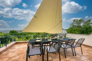 Balkon lub taras w obiekcie Villa Aqua