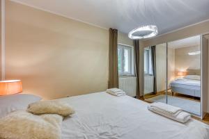 Łóżko lub łóżka w pokoju w obiekcie Villa Aqua