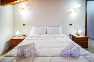 Posteľ alebo postele v izbe v ubytovaní Tenuta Un Posto Al Sole Luxury B&B