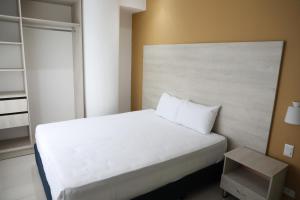 Postel nebo postele na pokoji v ubytování Hotel Súper Estrellas