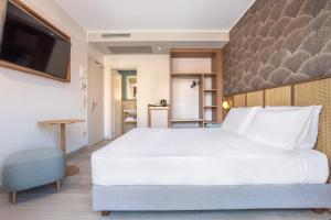 Postel nebo postele na pokoji v ubytování Hotel Diana