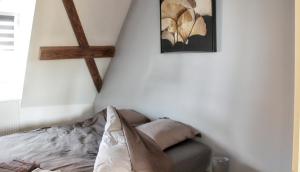 Tempat tidur dalam kamar di Appartement de 3 chambres avec terrasse amenagee et wifi a Eguisheim
