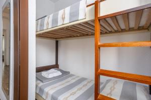 Łóżko lub łóżka w pokoju w obiekcie Apartments Villa Temer