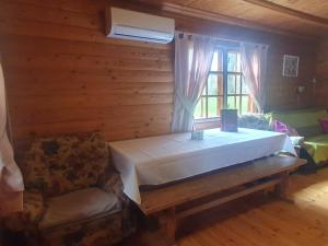 Postel nebo postele na pokoji v ubytování Holiday Home Dālderi
