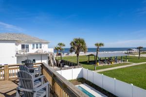 a deck with a view of the beach at Ocean River View Pool Home Close to Amenities 6635T in New Smyrna Beach