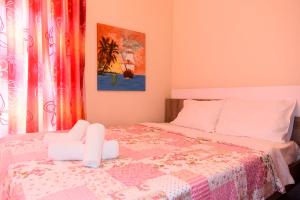 A bed or beds in a room at La luna house