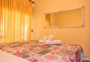 A bed or beds in a room at La luna house Még 37 kép