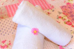 A bed or beds in a room at La luna house