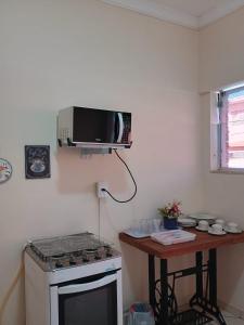 A cozinha ou cozinha compacta de Divino Lugar