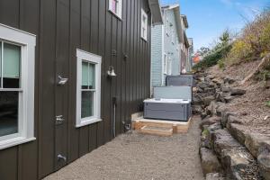 a building with a bath tub on the side of it at Solitude by Seabrook Hospitality in Pacific Beach